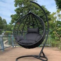 Stylish outdoor hammock swing with plush cushions and durable frame, perfect for relaxing in the garden or on the patio.