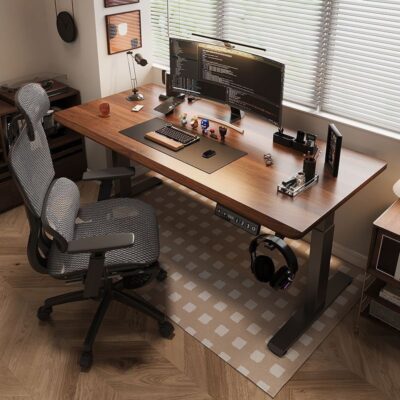 An electric-powered home office desk with an adjustable height feature, sleek design, and a spacious surface, ideal for modern workspaces.