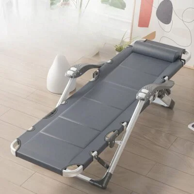 A foldable reclining chair with silver legs, designed for comfort and space-saving storage.