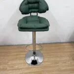 Modern Homium Barstool with a sleek metal frame, cushioned seat, and adjustable height, perfect for kitchens and bar areas.