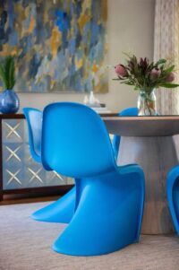 Vitra Panton Mid-Century Dining Table featuring sleek lines and a minimalist design, ideal for modern dining spaces.