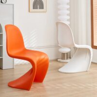 A set of Verner Panton-inspired modern dining chairs featuring smooth, curved plastic seats and a bold, sculptural design perfect for contemporary interiors.