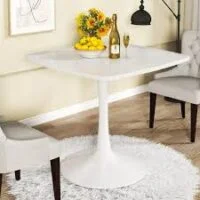 A stylish Pedestal Dining Table with a central pedestal base, offering a sleek and elegant design for modern and traditional dining spaces.