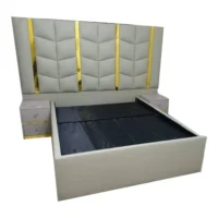 Large luxurious modern bed with a sleek design and plush upholstery for ultimate comfort.