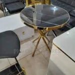 Elegant Heritage Round Table made of high-quality wood, featuring a smooth finish and classic design, perfect for dining spaces.