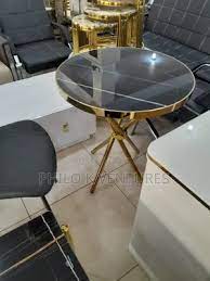 Elegant Heritage Round Table made of high-quality wood, featuring a smooth finish and classic design, perfect for dining spaces.