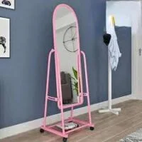A free-standing, full-length cheval mirror with a swiveling frame, designed for adjustable viewing and elegant room decor.