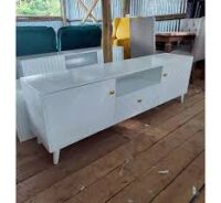 A stylish Bunbury Classic White TV Stand with ample storage, a clean white finish, and cable management for an organized entertainment space.