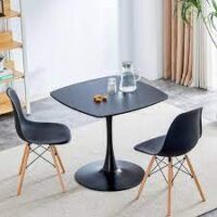 A stylish Pedestal Dining Table with a central pedestal base, offering a sleek and elegant design for modern and traditional dining spaces.