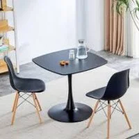 A stylish Pedestal Dining Table with a central pedestal base, offering a sleek and elegant design for modern and traditional dining spaces.