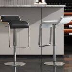 Lem Adjustable Bar Stool with sleek design, adjustable height, and comfortable faux leather seat, supported by a sturdy metal frame.