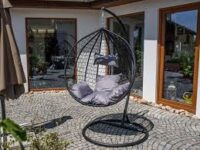 FloatEase Hammock featuring modern design, weather-resistant fabric, and ergonomic support, perfect for relaxing outdoors or indoors.