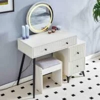 Elegant vanity table with mirror and storage drawers, perfect for makeup and grooming in a stylish bedroom setting.