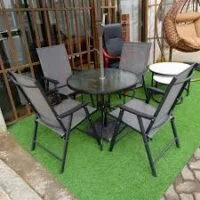 4-seater outdoor set with weather-resistant seating and a durable table, perfect for patios, gardens, and outdoor gatherings.