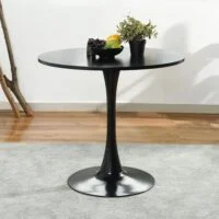 "Modern round dining table with a smooth wood surface and minimalist metal legs in a contemporary dining room."