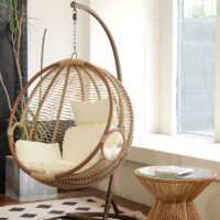 A stylish and comfortable chic outdoor hammock swing, perfect for relaxing in your backyard or patio with a modern design.