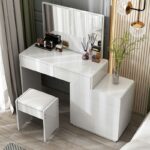 Sleek and stylish modern white vanity dressing table with a mirror and ample storage space for beauty essentials and accessories.
