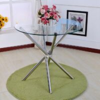 Sleek modern glass home dining table with a minimalist design and sturdy base, perfect for contemporary dining rooms.