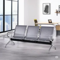 metallic corridor bench, metal bench, corridor furniture, hallway bench, modern bench, contemporary bench, industrial bench, silver bench, chrome bench, linked bench, connected bench, waiting area bench, public seating, minimalist bench, steel bench, bench with backrest, bench with armrest, modular seating, three-seat bench, durable bench, commercial bench, indoor bench, sleek bench, smooth finish, corridor seating, public space bench, polished metal, metal frame bench, silver finish, ergonomic bench, office corridor bench, institutional seating, bench for lobby, bench with support, robust bench, welded frame bench, clean line bench, architectural bench, hallway seating, polished surface, metallic seating, hallway furniture, steel seating, urban furniture, train station bench, airport seating, hospital bench, linked seating, maintenance-free bench, non-upholstered bench, heavy-duty bench, metal legs, space-saving bench, stackable bench