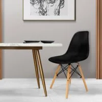 Black Eames Dining Home Chair, Eames style chair, black dining chair, modern home chair, designer dining chair, molded plastic chair, Eames replica chair, black Eames side chair, minimalist dining chair, Scandinavian chair, black armless chair, ergonomic dining chair, contemporary home chair, stylish black chair, molded seat chair, modern plastic chair, black Eames molded chair, classic dining chair, sleek dining room chair, home furniture chair, mid-century modern chair, black home chair, black modern seat, Eames-inspired chair, minimalist Eames chair, dining chair with wood legs, black accent chair, plastic home chair, black kitchen chair, side dining chair, black molded chair, retro-style chair, armless plastic chair, black indoor chair, Eames DSW chair, sturdy dining chair, wooden leg chair, black Eames DSW, versatile dining chair, black plastic seat, Eames design chair, chic dining chair, compact dining chair, space-saving dining chair, home dining seat, decorative black chair, black Eames kitchen chair, sleek Eames dining chair, lightweight plastic chair, molded ergonomic seat, durable home chair, molded black chair, stylish home seating, modern black chair, black living room chair, multipurpose chair, home office chair, decorative Eames chair, sturdy black chair, smooth finish chair, mid-century dining seat, Eames-inspired furniture, black side seating, kitchen side chair, cozy home chair, solid plastic chair, black furniture piece, black chair with wooden legs, black ergonomic home chair, interior dining chair, elegant black chair, molded modern chair, black plastic furniture, dining table chair, black side dining seat, trendy Eames chair, residential black chair, black Eames side seat, stylish plastic chair, timeless dining chair, matte black chair, easy-to-clean chair, comfortable plastic seat, black designer furniture, black molded dining seat, black modern Eames style chair, home use Eames chair, classic plastic chair, chic interior chair, black seat for dining, black molded plastic seat.