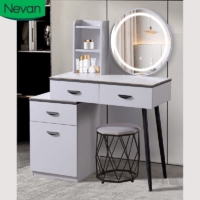 dressing table, dressing table with mirror, round mirror dressing table, vanity table, bedroom vanity, makeup table, wooden dressing table, modern dressing table, contemporary vanity, bedroom furniture, storage vanity, makeup station, cosmetic table, dressing table set, round mirror vanity, elegant dressing table, sleek vanity, home vanity, stylish dressing table, bedroom décor, makeup organizer table, compact dressing table, minimalistic vanity, functional dressing table, beauty table, mirror vanity, furniture with mirror, wooden vanity, dressing table with drawers, luxury dressing table, small bedroom vanity, decorative dressing table, bedroom storage furniture, mirror and table set, modern bedroom furniture, cosmetic vanity, vanity desk, home makeup station, portable dressing table, chic vanity, designer dressing table, makeup vanity set, bedroom organization, round mirror furniture, furniture décor, makeup furniture, vanity dresser, space-saving vanity, furniture for bedroom, contemporary dressing table, vanity with storage