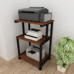printer stand, 3 tier printer stand, multi-purpose printer stand, office printer table, wooden printer stand, printer shelf organizer, compact printer stand, space saving printer stand, home office furniture, printer storage rack, desktop printer shelf, modern printer stand, printer cart with shelves, sturdy printer table, printer stand with storage, office organization furniture, small printer stand, multifunctional shelf unit, printer stand for home office, printer stand wood and metal, minimalist printer stand, printer stand with tiers, printer stand for small spaces, printer stand with open shelves, office desk accessory, printer holder table, ergonomic printer stand, durable printer rack, printer stand with compartments, printer table organizer, printer stand furniture, printer stand for laser printer, printer stand for inkjet printer, stylish printer stand, heavy duty printer stand, printer shelf unit, printer stand for workspace, office storage solution, printer stand with bottom shelf, printer stand for documents, printer stand for supplies, printer stand for accessories, printer stand for organization, printer stand modern design, printer stand rectangular, printer stand industrial style, printer stand for office use, printer stand for home use, printer stand multi-level, printer stand compact design